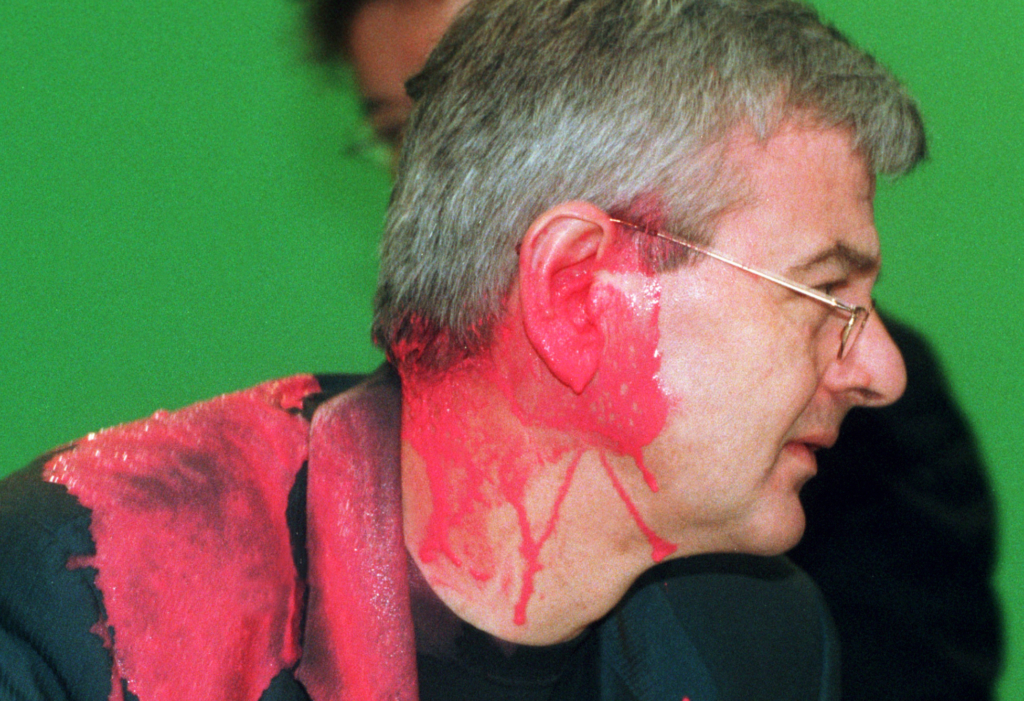 Green Party politician Joschka Fischer, shortly after being hit by a paint capsule at a special meeting of his party on the Kosovo war.