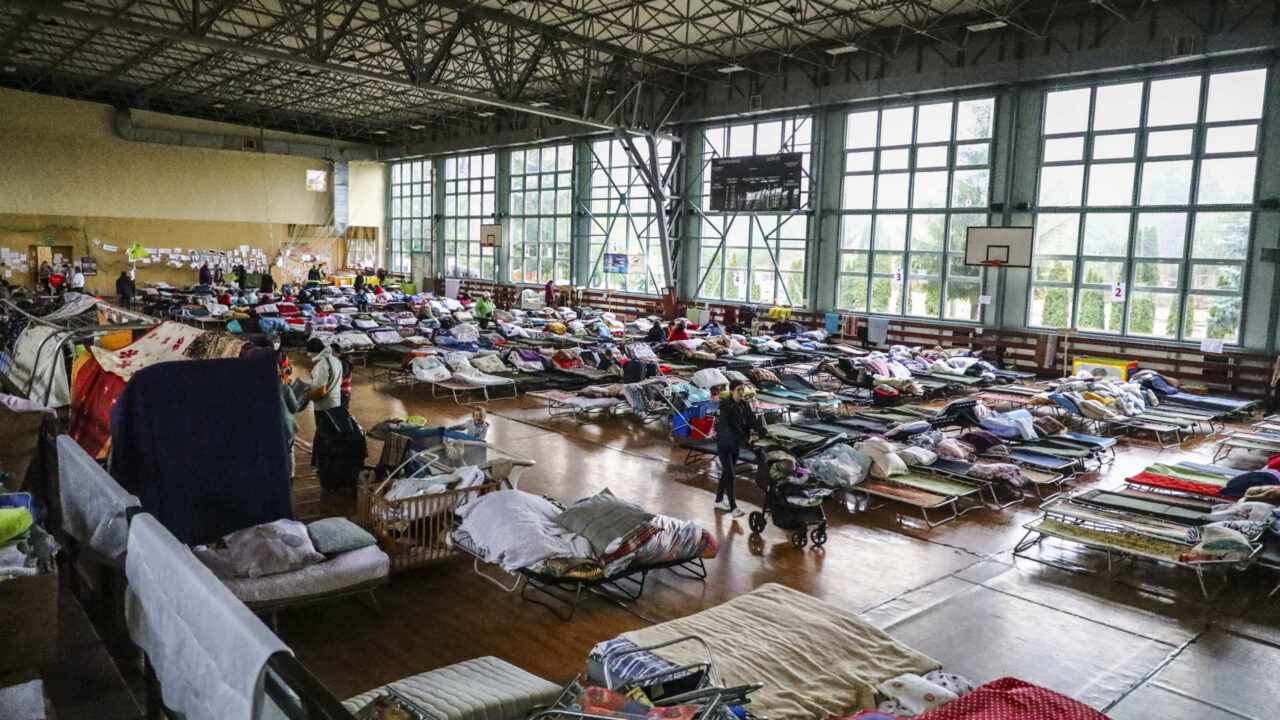 Refugees from Ukraine who crossed Ukrainian-Polish border due to ongoing Russian military invasion are seen at a temporary shelter inside the reception point organized in a sports hall in Hrubieszow, Poland on April 1st 2022. Russian invasion on Ukraine causes a mass exodus of refugees to Poland. (Photo by Beata Zawrzel/NurPhoto)