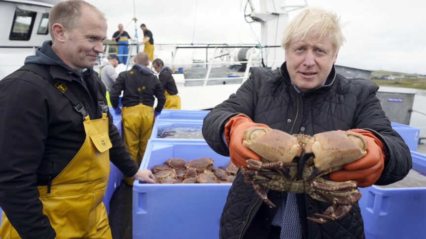 23/07/2020. Scotland, United Kingdom. Boris Johnson visits Scotland. The Prime Minister Boris Johnson with live Crab on Copland Dock Orkney as part of his tour of Orkney and the Highlands. Picture by Andrew Parsons / No 10 Downing Street