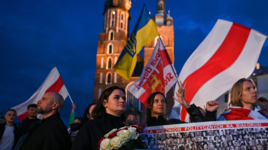 Exiled leader of the opposition in Belarus, Svetlana Tikhanovskaya (center left), meets with members of the local Belarusian diaspora outside the Adam Mickiewicz monument during her short visit to Krakow. On Sunday, October 02, 2022, in Krakow, Poland. (Photo by Artur Widak/NurPhoto)