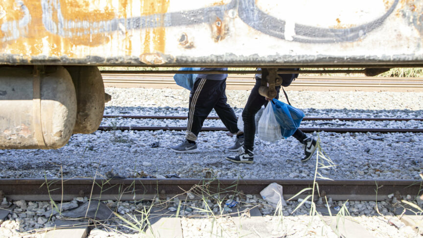 Male asylum seekers as seen in abandoned old train carriages near Thessaloniki city on their way to follow the Balkan Route towards Northern Macedonia. From the wagons they jump onto cargo trains which takes them to Idomeni, the borders with N. Macedonia. They wait and form groups to cross the borders in the mountains and reach other European countries like Germany, France, Sweden etc via the Balkan route. Refugees and migrants arrive at the railway station from Turkey after a long multi day journey on foot following marked routes in social media or following the rails and highway but others via smugglers paying sometimes 2500 euro to move them from Turkey here. Some of them complained for pushbacks from the N. Macedonian police after treating them violently and beating them. At Idomeni there is the station and the fenced part of the borders which are guarded by Greek police and European Frontex forces. Most of the group were from Afghanistan, some from Syria, Iraq, Palestine, Pakistan, and Morocco. The flows of people arriving from Turkey are increasing every day as the refugee and migrant crisis is still ongoing. Thessaloniki, Greece on October 2022 (Photo by Nicolas Economou/NurPhoto)