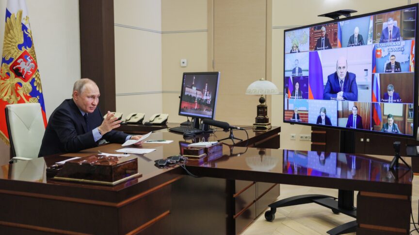 Russian President Vladimir Putin gestures while attending a cabinet meeting via videoconference at the Novo-Ogaryovo residence outside Moscow, Russia, Wednesday, March 29, 2023. (Gavriil Grigorov, Sputnik, Kremlin Pool Photo via AP)
