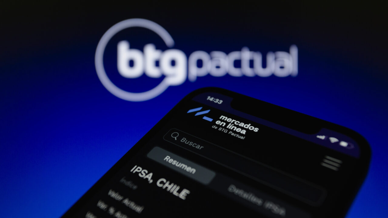 November 21, 2022, Asuncion, Paraguay: Mercados en Linea platform displayed on a smartphone backdropped by BTG Pactual logo. Sao Paulo – BTG Pactual, the largest investment bank in Latin America, launched its first investment platform outside Brazil, in Chile. The bank has adapted Mercados en Linea, a monitor of the local market, into an open digital platform, which enables the bank’s customers in the country to directly access a number of investment products in the web. (Credit Image: Â© Andre M. Chang/ZUMA Press Wire