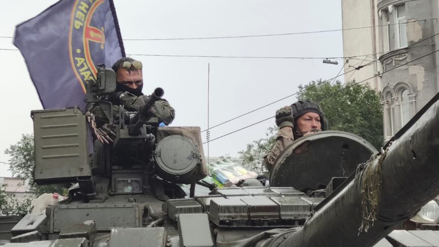 Servicemen sit in a tank with a flag of the Wagner Group military company, as they guard an area at the HQ of the Southern Military District in a street in Rostov-on-Don, Russia, Saturday, June 24, 2023. Russia’s security services had responded to Prigozhin’s declaration of an armed rebellion by calling for his arrest. In a sign of how seriously the Kremlin took the threat, security was heightened in Moscow, Rostov-on-Don and other regions. (AP Photo)
