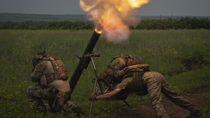 FILE – Ukrainian soldiers fire toward Russian position on the frontline in Zaporizhzhia region, Ukraine, Saturday, June 24, 2023. Battles are also raging along the southern front in Zaporizhzhia, where Ukrainian forces are making minimal gains and coming up against formidable Russian fortifications. (AP Photo/Efrem Lukatsky, File)
