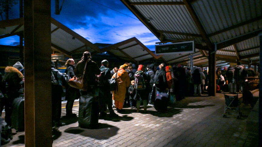 Ukrainians standing in line at passport control after arriving in the evening train from Ukraine to Przemysl railway station. According to research conducted by Lalafo, about half of Ukrainians who came to Poland because of the war are of working age. Over 96% are women aged 30-50, 16% are under this age, and 10% are elderly. As per the Lalafo survey, almost 90% have children, usually one or two. Half of forced migrants from Ukraine want to return home after the war, while about 12% express a desire to stay in Poland. On Thursday, December 22, 2022, in Przemysl, Subcarpatian Voivodeship, Poland. (Photo by Artur Widak/NurPhoto)