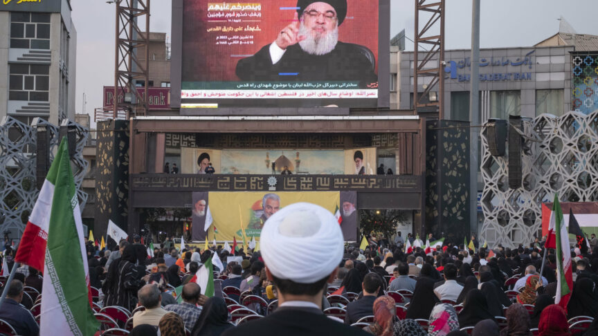 An Iranian cleric stands at a square in Tehran as Lebanon’s Hezbollah Secretary-General Hassan Nasrallah gives a speech, November 3, 2023. Hassan Nasrallah spoke in Beirut about the Israeli army’s attack on Gaza and warned Israel about a possible attack on Lebanon. (Photo by Morteza Nikoubazl/NurPhoto)