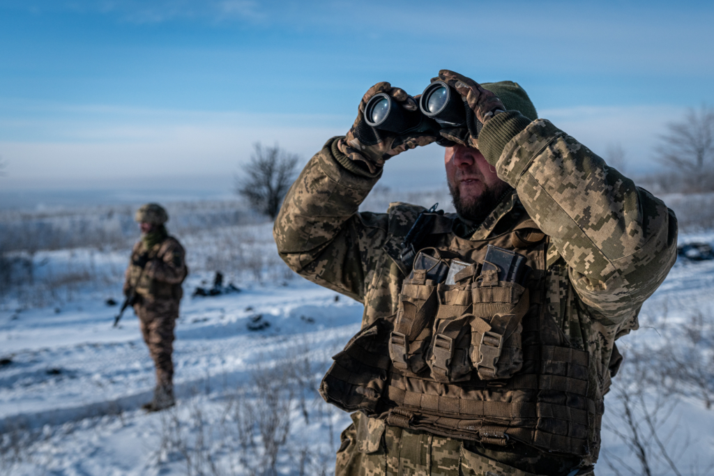 DONETSK OBLAST, UKRAINE - JANUARY 13: Ukrainian soldiers look at the sky in search for a nearby Russian drone at the Bakhmut frontline, in Donetsk Oblast, Ukraine on January 13, 2024. Drone and air strikes have become increasingly important as the war entered into a stalemate and both sides are heavily fortified.