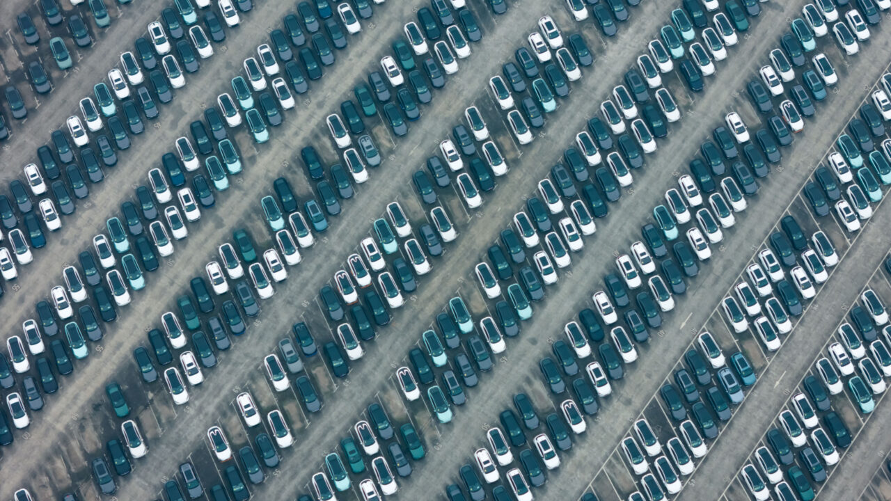 A view of new energy cars waiting for distribution on the parking lot of a Chinese carmaker in southwest China’s Chongqing Municipality Sunday, Jan. 14, 2024. China produced 30.16 million units of vehicles in 2023., Credit:LI HONGBO / Avalon