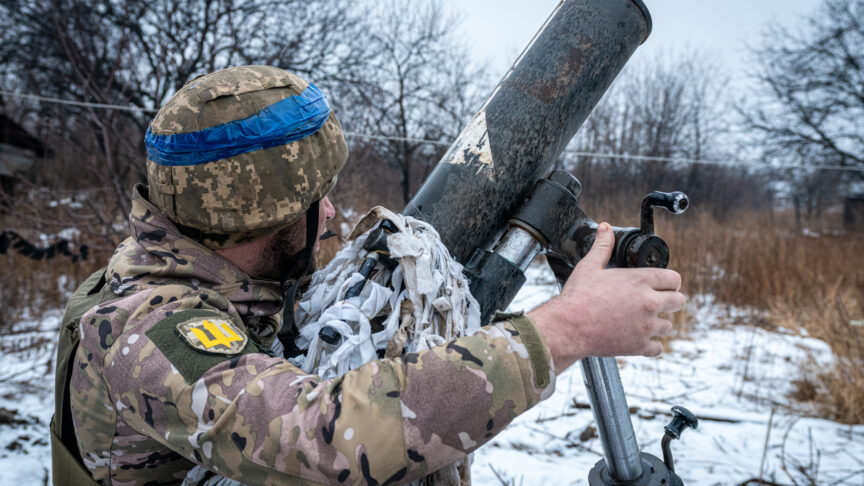 DONETSK OBLAST, UKRAINE – JANUARY 26: A Ukrainian soldier prepares a mortar before shooting a target in the direction of Bakhmut, where clashes between Russia and Ukraine continue to take place, in Donetsk Oblast, Ukraine on January 26, 2024. Ignacio Marin / Anadolu