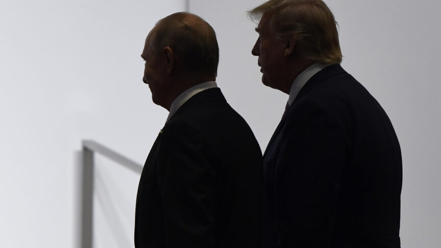 FILE – In this June 28, 2019, file photo, President Donald Trump and Russian President Vladimir Putin walk to participate in a group photo at the G20 summit in Osaka, Japan. (AP Photo/Susan Walsh, File)