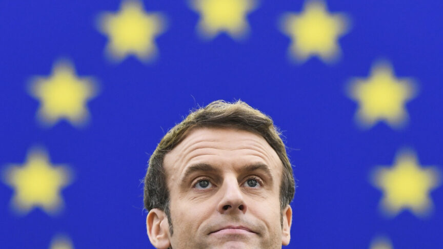 FILE – French President Emmanuel Macron delivers a speech at the European Parliament, Jan. 19, 2022 in Strasbourg, eastern France. Macron has on Thursday, March 3, 2022 formally announced he will run for a second term in April’s presidential election. (Bertrand Guay, Pool Photo via AP, File)