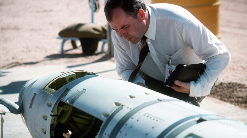 A Soviet inspector examines a BGM-109G Tomahawk ground launched cruise missile (GLCM) prior to its destruction.  Forty-one GLCMs and their launch canisters and seven transporter-erector-launchers are being disposed of at the base in the first round of reductions mandated by the Intermediate Range Nuclear Forces Treaty.