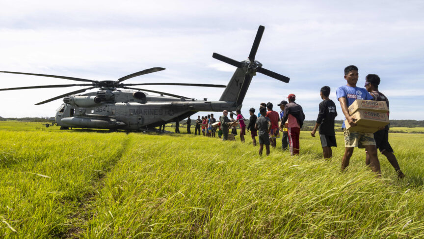 August 3, 2023, Basco, Batanes Province, Philippines: Filipino volunteers help unload emergency relief supplies from a U.S. Marine Corp CH-53E Super Stallion helicopter in the aftermath of Typhoon Egay, August 3, 2023 on Fuga Island, Philippines. The category 4 hurricane sweep across part of the Philippines with 140 mph winds killing at least 26 people and causing widespread damage. (Credit Image: Â© Cpl. Sean Potter/Us Army/Planet Pix via ZUMA Press Wire