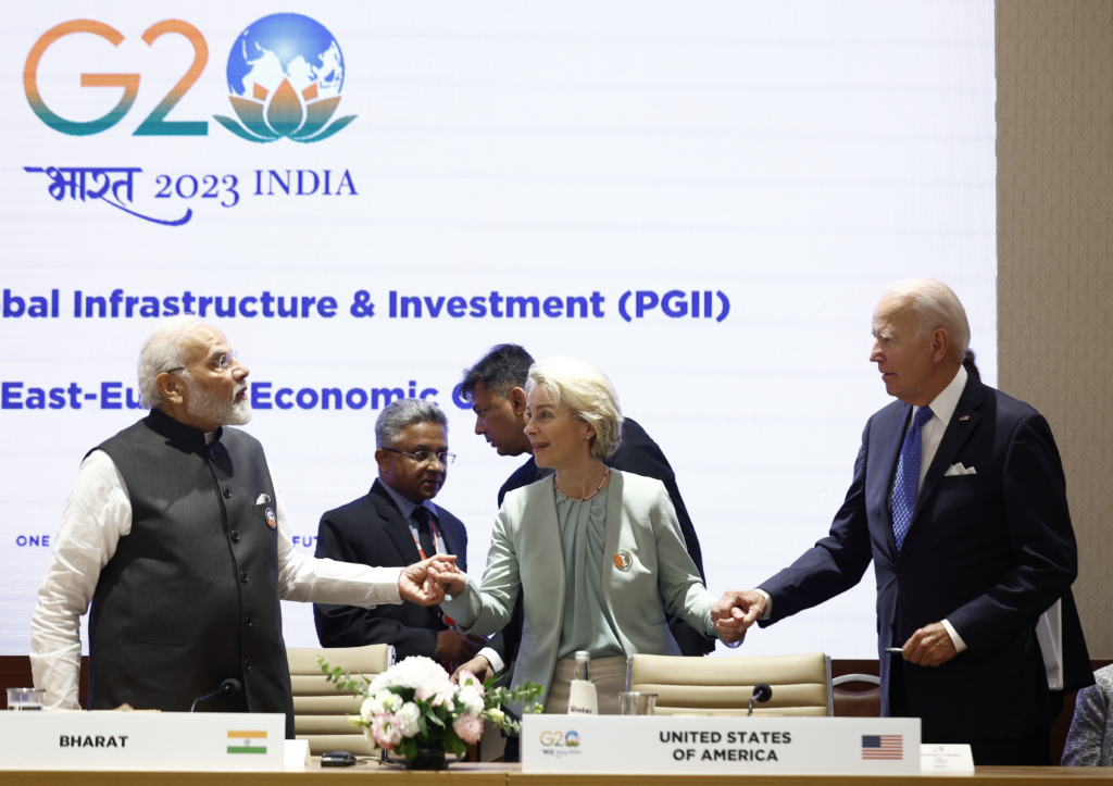 President of the European Union Ursula von der Leyen, center, holds hands with U.S. President Joe Biden, right, and Indian Prime Minister Narendra Modi as they attend Partnership for Global Infrastructure and Investment event on the day of the G20 summit in New Delhi, India, Sept. 9, 2023. (AP Photo/Evelyn Hockstein, Pool)
