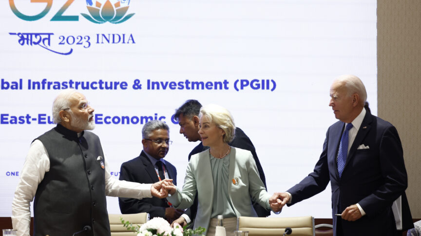 President of the European Union Ursula von der Leyen, center, holds hands with U.S. President Joe Biden, right, and Indian Prime Minister Narendra Modi as they attend Partnership for Global Infrastructure and Investment event on the day of the G20 summit in New Delhi, India, Sept. 9, 2023. (AP Photo/Evelyn Hockstein, Pool)