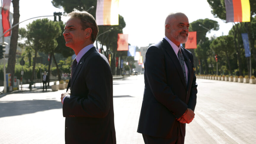 Albania’s Prime Minister Edi Rama, right, waits to welcome other leaders, as his Greek counterpart Kyriakos Mitsotakis walks to the building of a summit in Tirana, Albania, Monday, Oct. 16, 2023. Leaders from the European Union and the Western Balkans hold a summit in Albania’s capital to discuss the path to membership in the bloc for the six countries of the region. (AP Photo/Franc Zhurda)