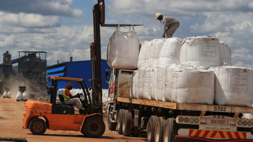 Workers load lithium concentrate at Prospect Lithium Zimbabwe mine in Goromonzi, Zimbabwe, January 9, 2024. REUTERS/Philimon Bulawayo