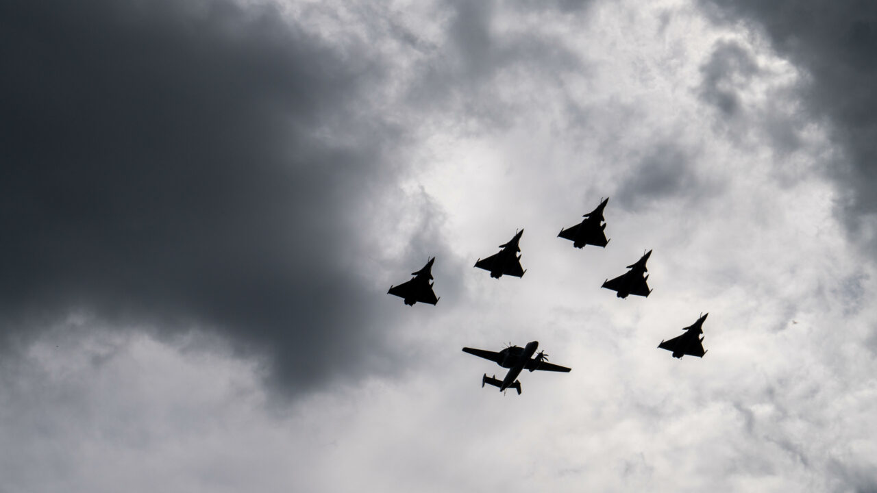 Paris, France – July 14, 2024: Military Aircraft Perform An Impressive Air Show During The National Day Celebrations In Paris, Gracing The Skies Above The City And Showcasing France’s National Pride And Military Strength