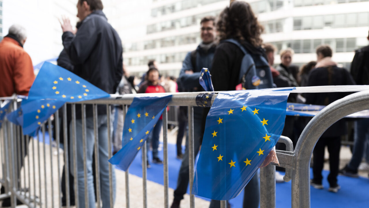 EU Flags hanging from the queue barriers during the Open Doors Day