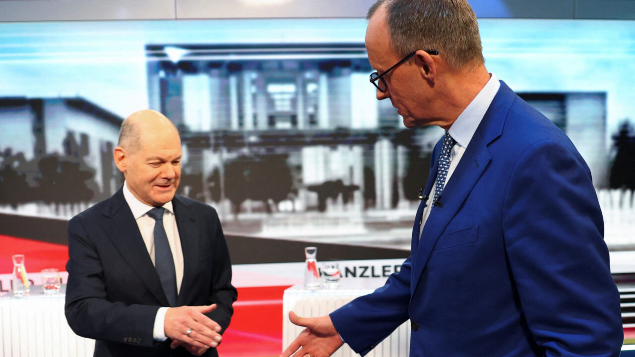 ATTENTION EDITORS – EMBARGOED FOR PUBLICATION UNTIL FEBRUARY 19, 2025 AT 21:15 CET 20:15 GMT. German Chancellor of the Social Democratic Party (SPD), Olaf Scholz and his conservative rival of the Christian Democratic Union (CDU) Friedrich Merz shake hands in a WELT TV studio ahead of a TV debate between Scholz and Merz, in Berlin, Germany, February 19, 2025. REUTERS/Fabrizio Bensch/Pool