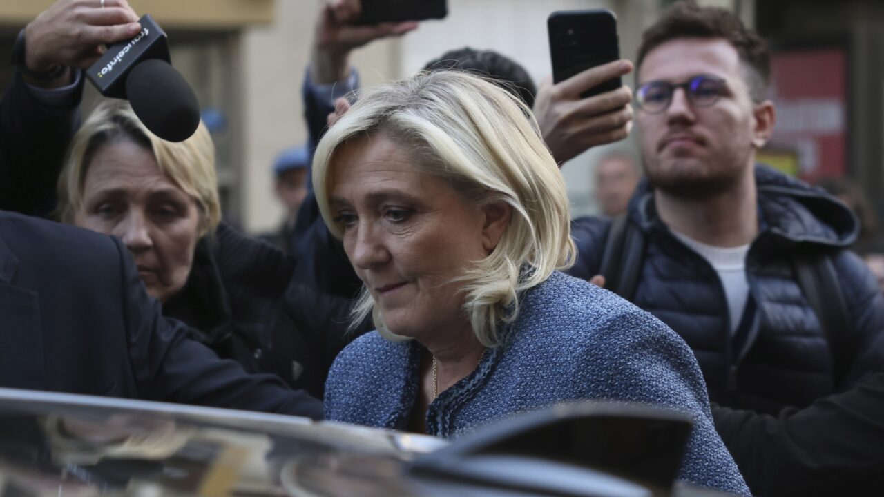French far-right leader Marine Le Pen leaves the National Rally headquarters after a French court convicted Marine Le Pen of embezzlement and barred her from seeking public office for five years, Monday, March 31, 2025 in Paris. (AP Photo/Thomas Padilla)