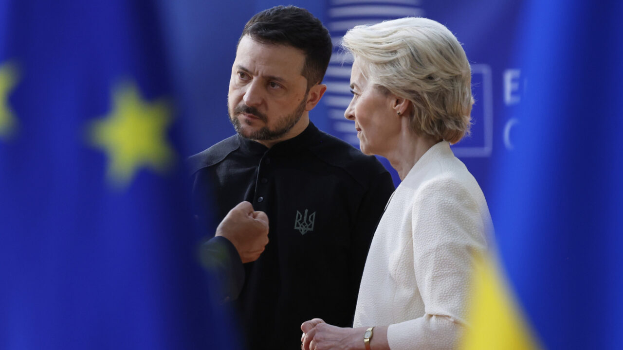 European Council President Antonio Costa, left, hidden behind flag, speaks with Ukraine’s President Volodymyr Zelenskyy, center, and European Commission President Ursula von der Leyen as they arrive for an EU Summit at the European Council building in Brussels, Thursday, March 6, 2025