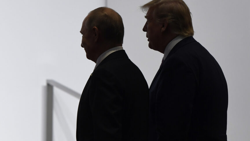 Putin (centre) and Trump (right centre) walk to the left with their backs to the camera.