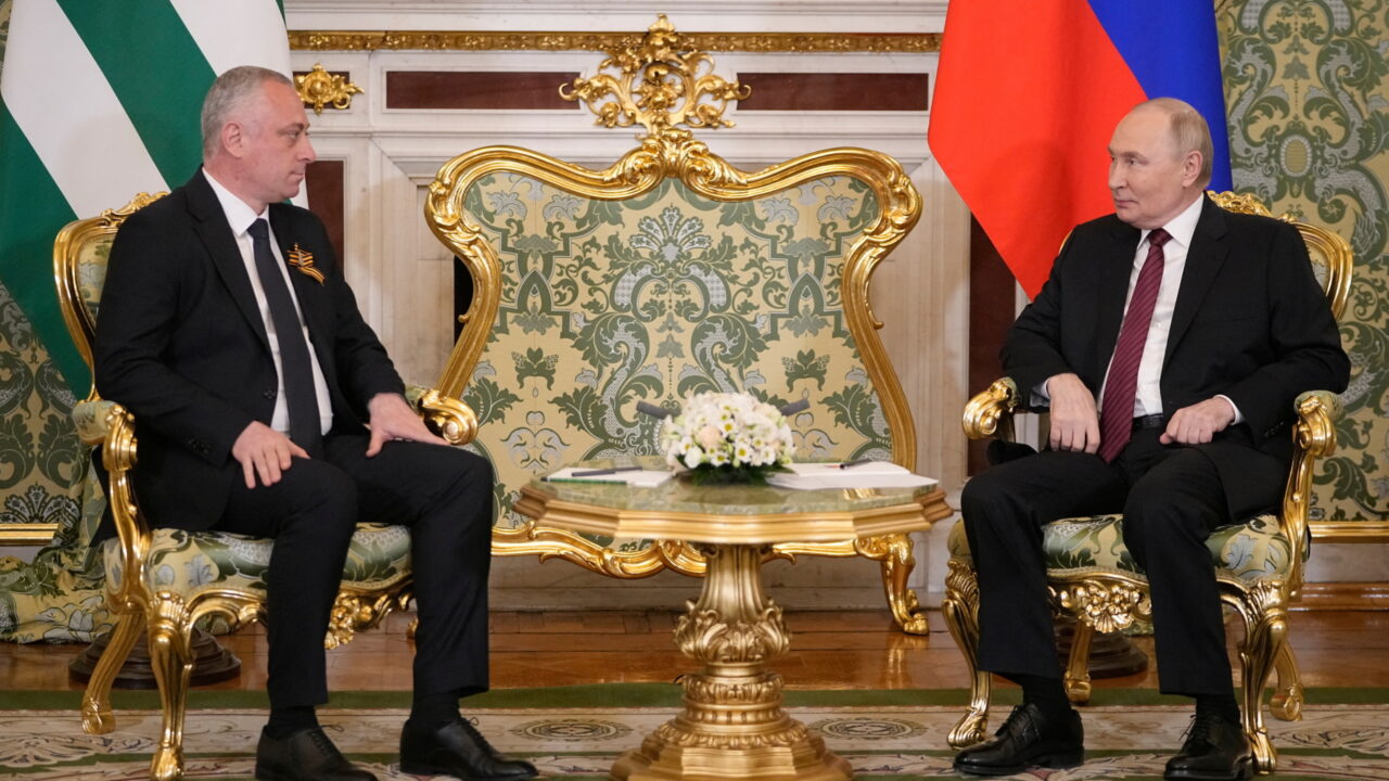 Russia’s President Vladimir Putin and President of Georgia’s breakaway region of Abkhazia Badra Gunba attend a meeting in the Grand Palace at the Kremlin in Moscow, Russia May 10, 2025