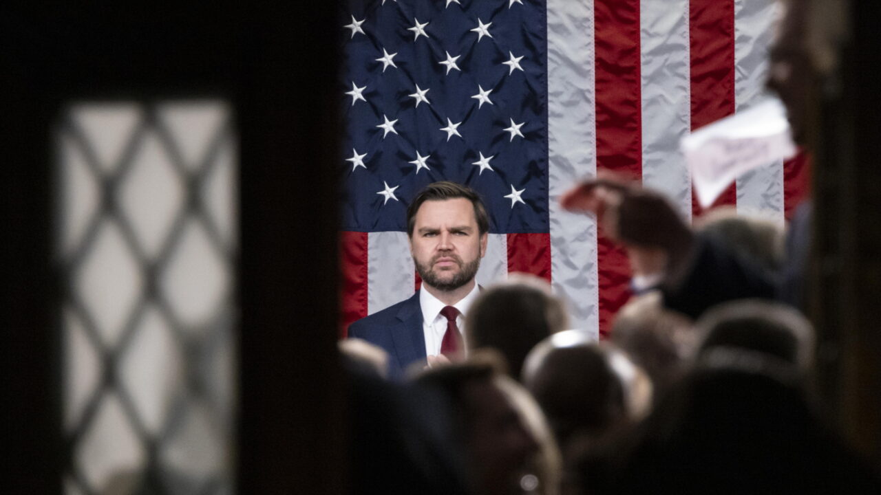 Vice President JD Vance stands as President Donald Trump enters the House Chamber