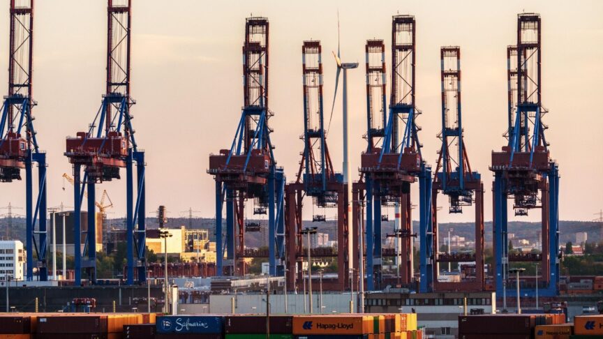 A Row Of Modern Container Cranes In The Port Of Hamburg - A Symbol Of Export Strength, Logistics Expertise And The Global Networking Of The German Economy.