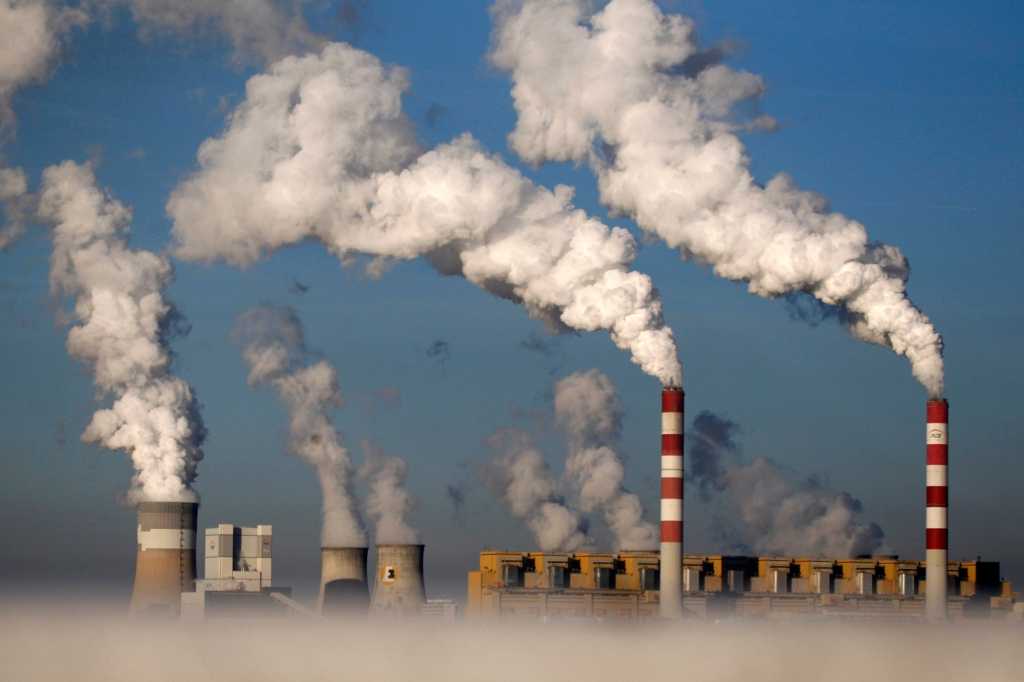 Smoke billows from the chimneys of the Belchatow Power Station