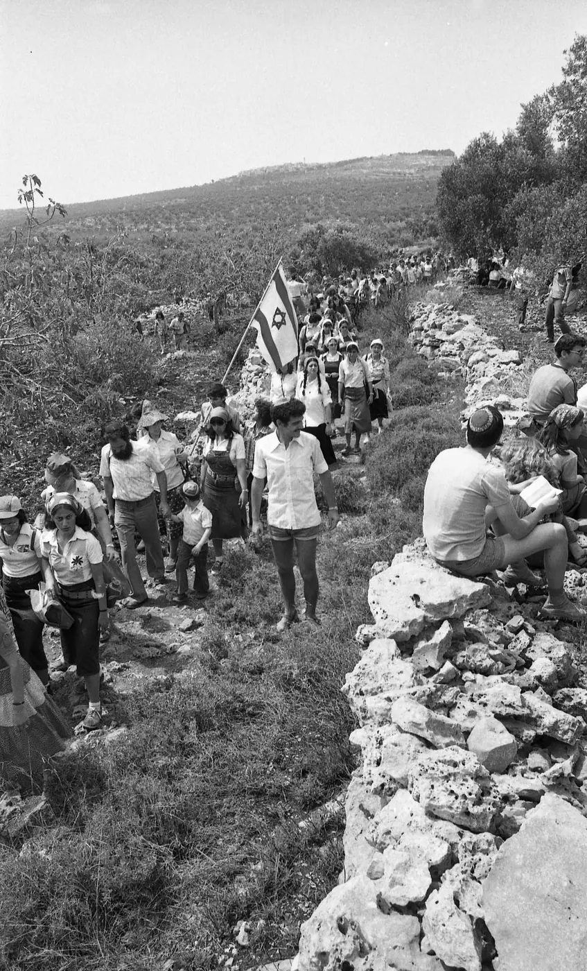 A march organised by the Gush Emunim movement to persuade the thousands on the march to buy a flat in the West Bank, 1979