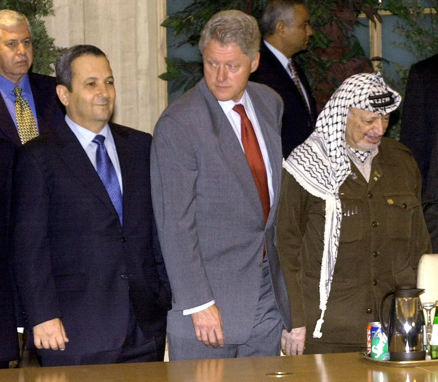 President Bill Clinton, flanked by Israeli prime minister Ehud Barak, left, and Palestinian leader Yasser Arafat, stands before giving the final statement at the Middle East Summit in Egypt, October 17th, 2000