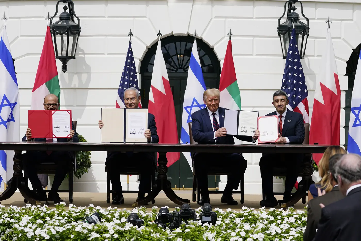 From left, Bahrain foreign minister Khalid bin Ahmed Al Khalifa, Israeli prime minister Binyamin Netanyahu, US president Donald Trump and UAE foreign minister Abdullah bin Zayed al-Nahyan, sit during the Abraham accords signing ceremony on the south lawn of the White House, in Washington, September 15th 2020