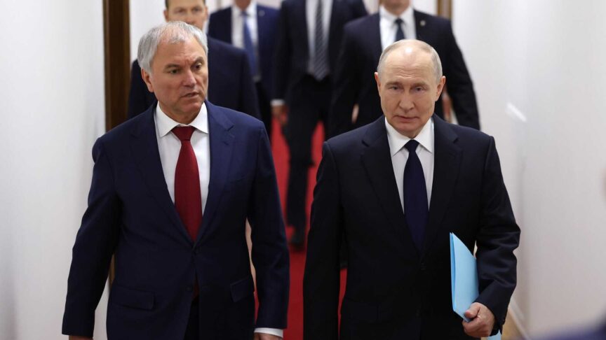Vladimir Putin walks into the opening of the new Duma with fellow politicians, Moscow, 30 September 2026