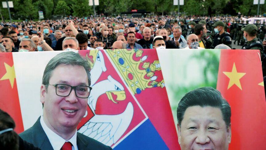 Pro-government supporters hold a banner of Serbian President Aleksandar Vucic and Chinese President Xi Jinping during a protest in front of the parliament building, amid the coronavirus disease (COVID-19) outbreak, in Belgrade, Serbia, May 11, 2020. REUTERS/Marko Djurica