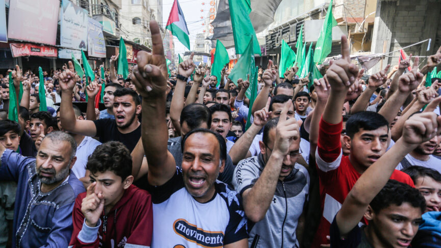 October 15, 2021, Gaza City, Palestine: Participants shouting slogans as they make gestures, during the rally..Palestinians take part in a rally marking the 10th anniversary of the prisonersâ swap deal between Hamas and Israel. Itâs been a decade since the last major swap deal between Israel and Hamas, in which Israel released over 1,000 prisoners in exchange for soldier Gilad Shalit, who spent five years in captivity. (Credit Image: © Mahmoud Issa/SOPA Images via ZUMA Press Wire