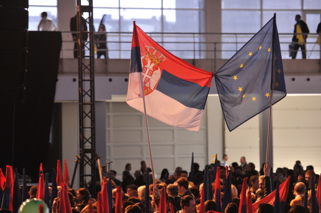 Serbian and EU flags intertwined