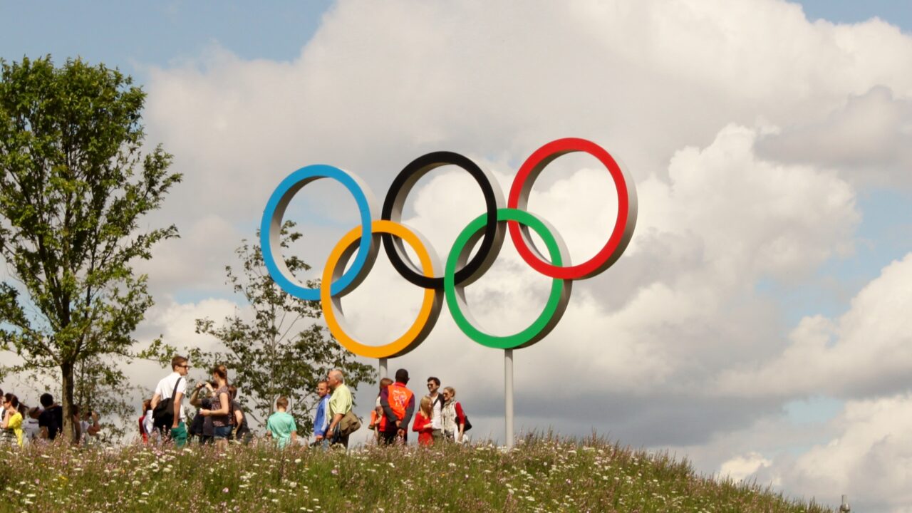 The five olympic rings above a hillside in England